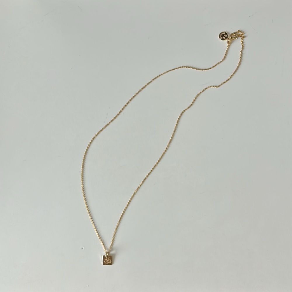 14K gold filled Om necklace with smiley face tag